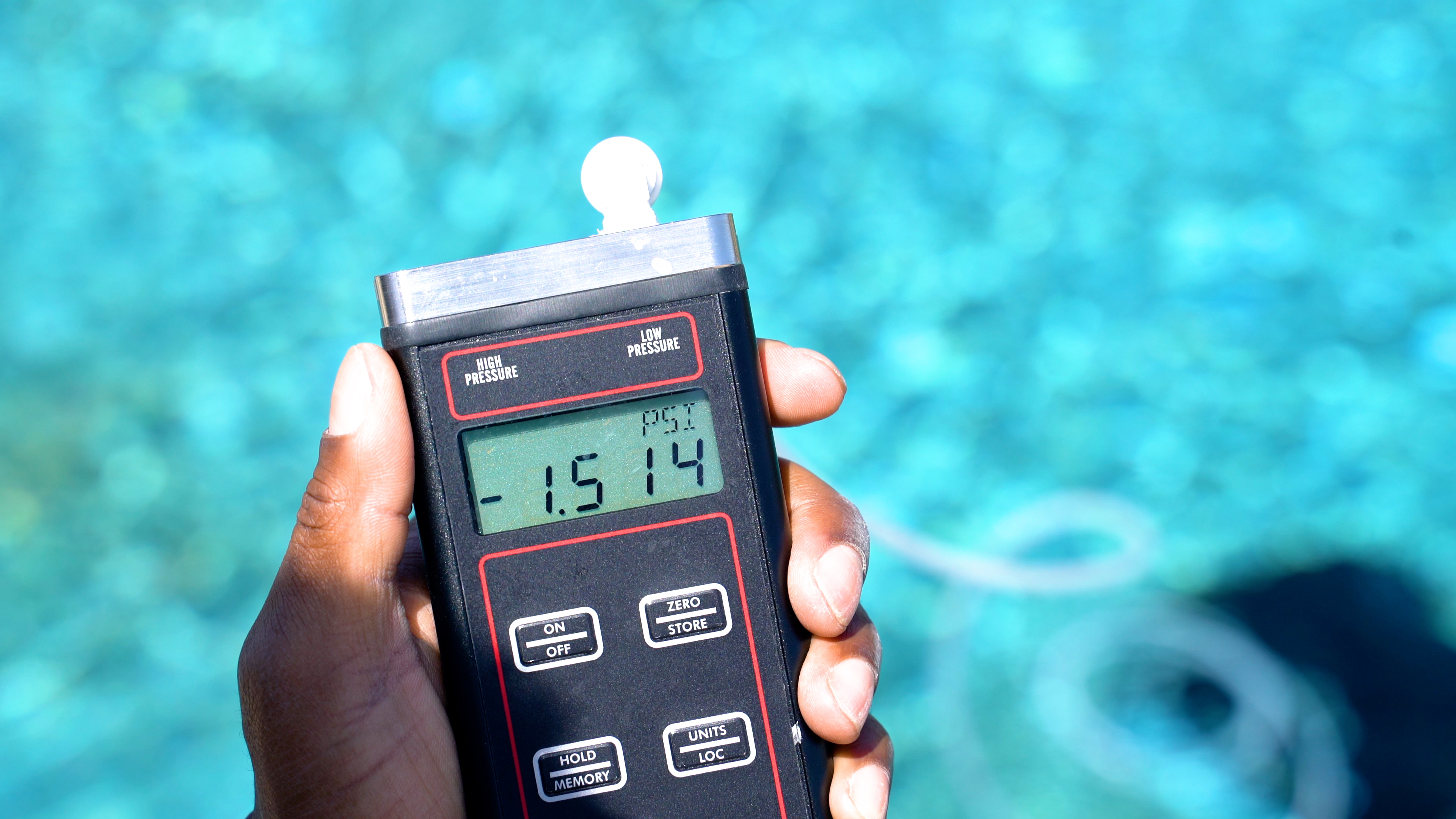 Beatbot AquaSense 2 Ultra Pressure Gauge Reading Pool Background