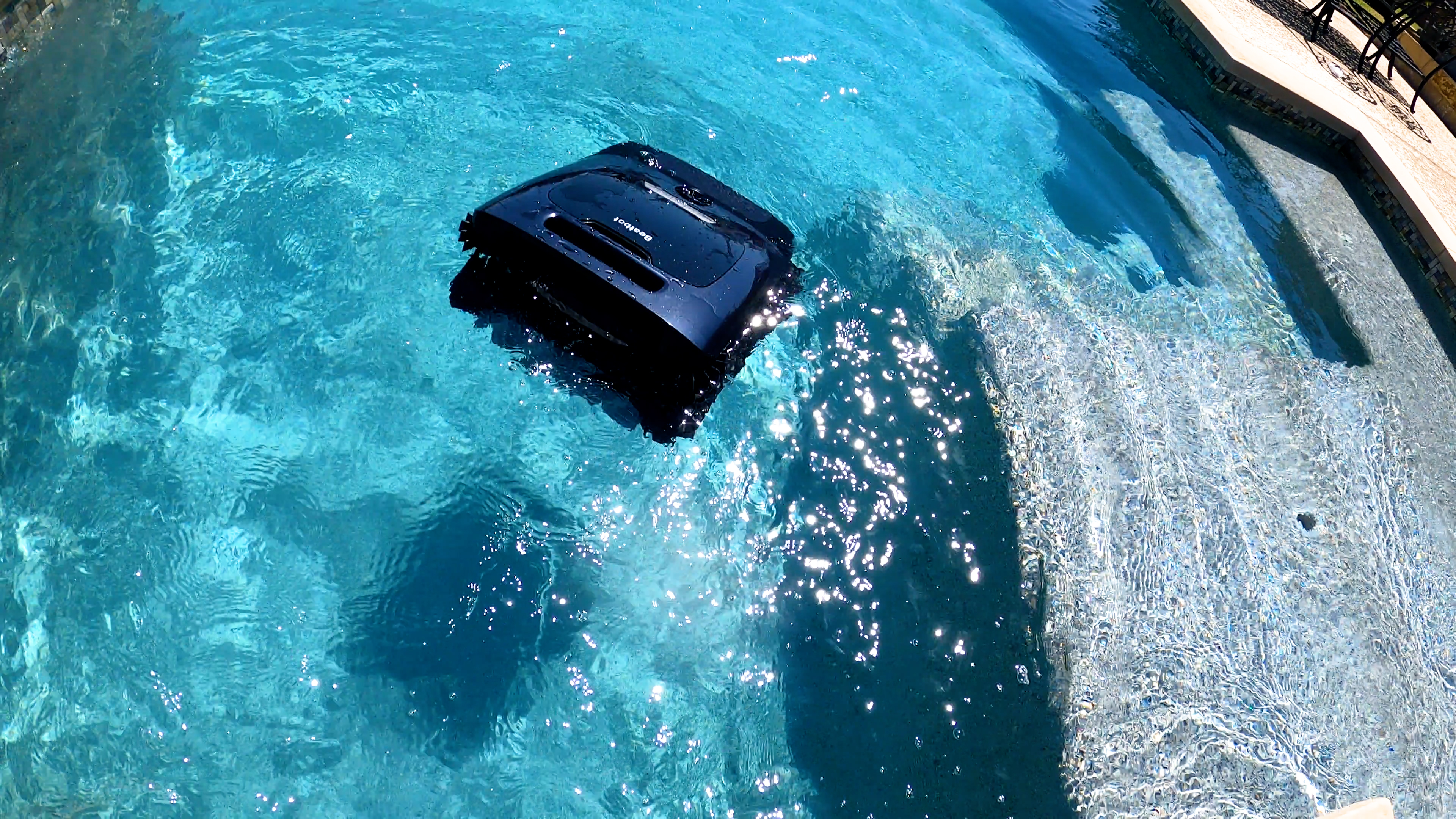 Beatbot AquaSense 2 Ultra Robot Floating Near Pool Steps