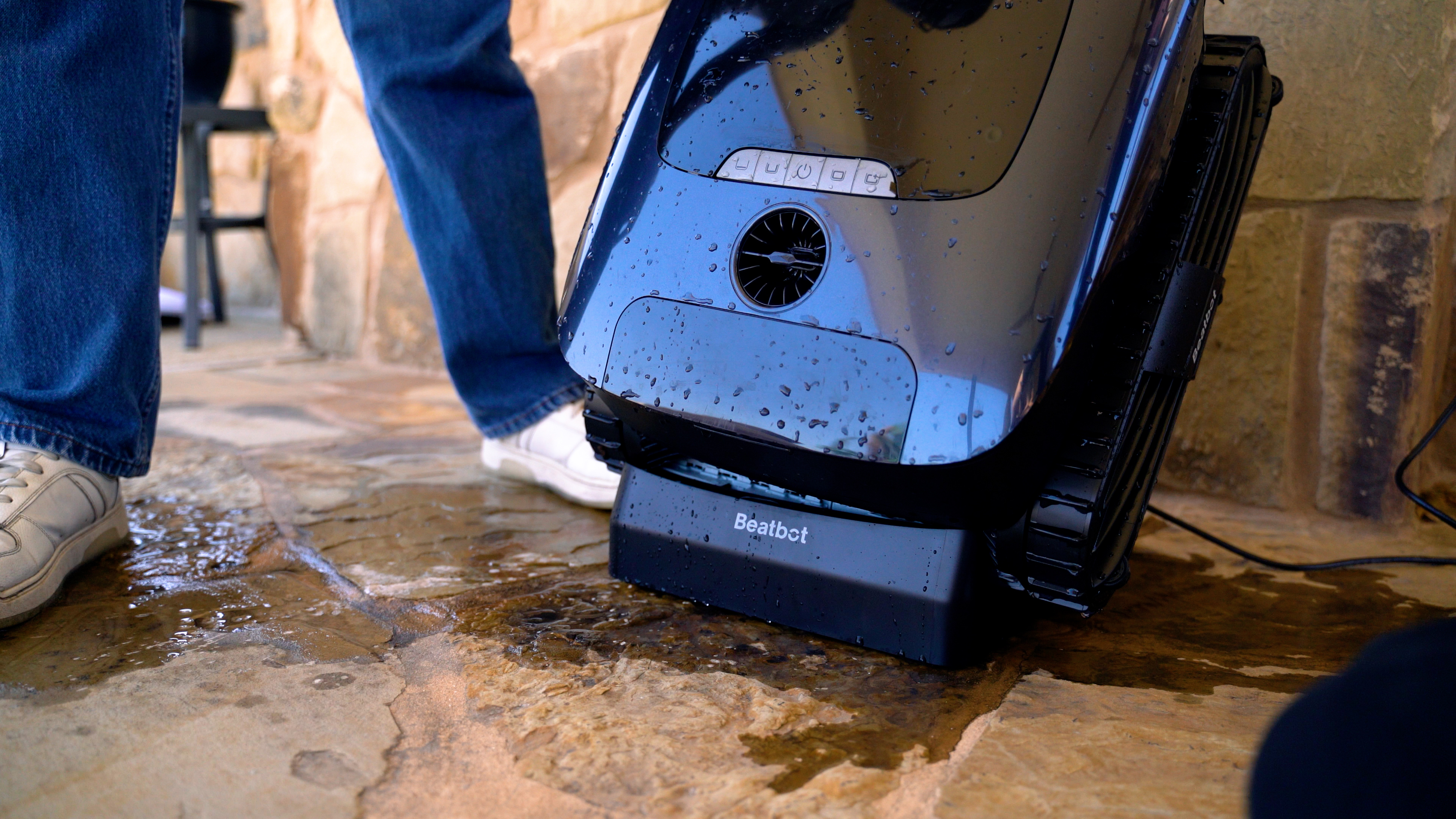 Beatbot AquaSense 2 Ultra Robot Wet Deck Treads Near Person