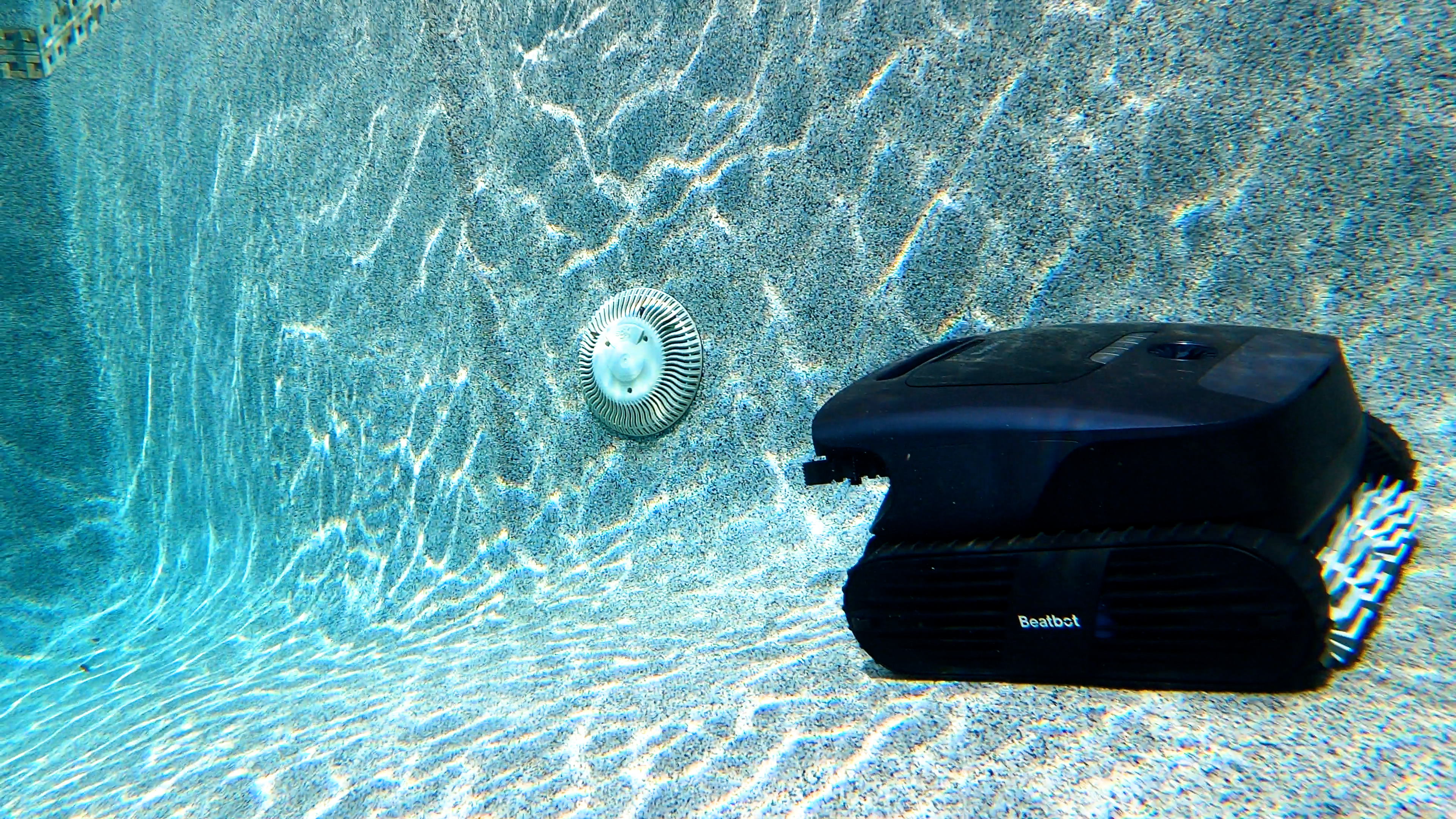 Beatbot AquaSense 2 Ultra Underwater Pool Robot Near Drain