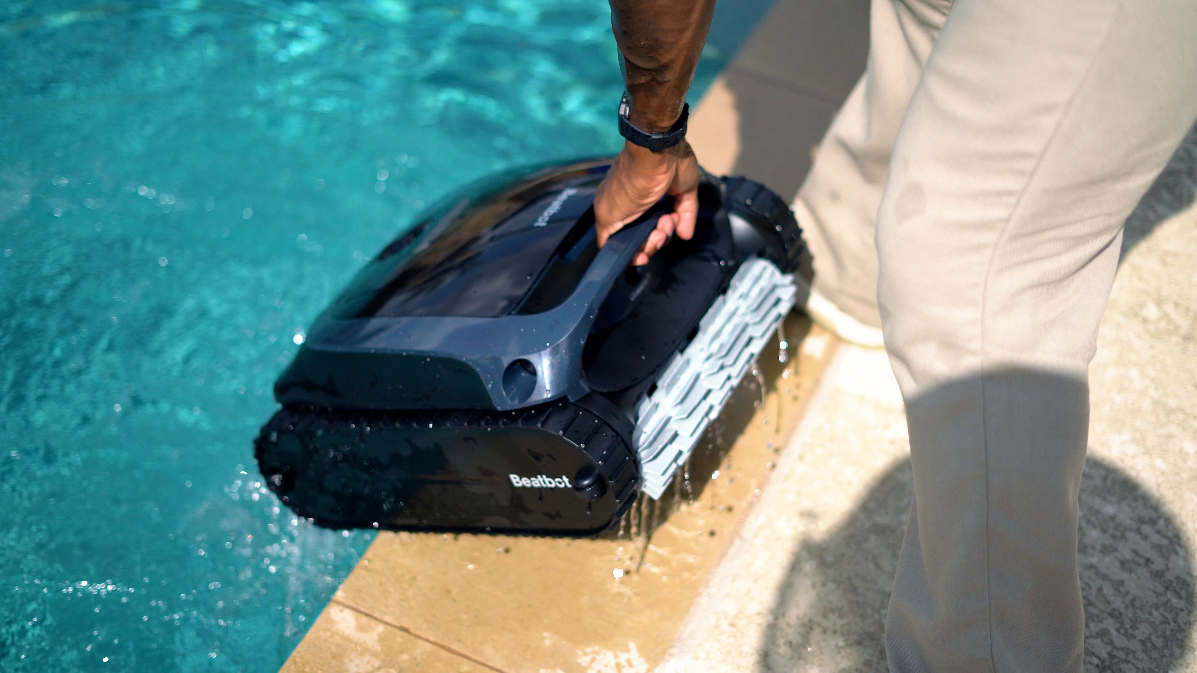 Beatbot AquaSense 2 Lifting Robot Onto Pool Deck Closeup