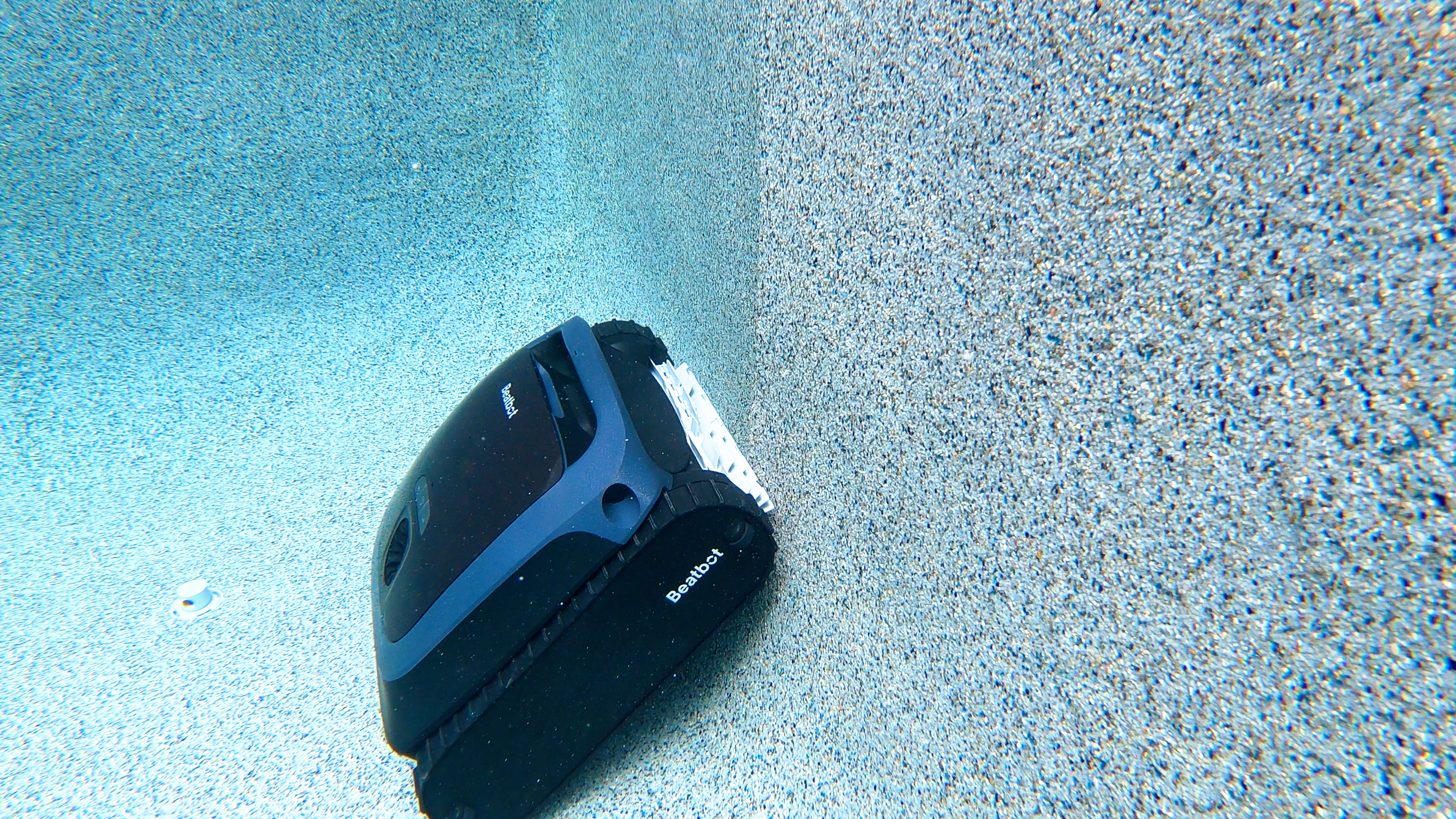 Beatbot AquaSense 2 Underwater Robot Near Textured Wall Corner