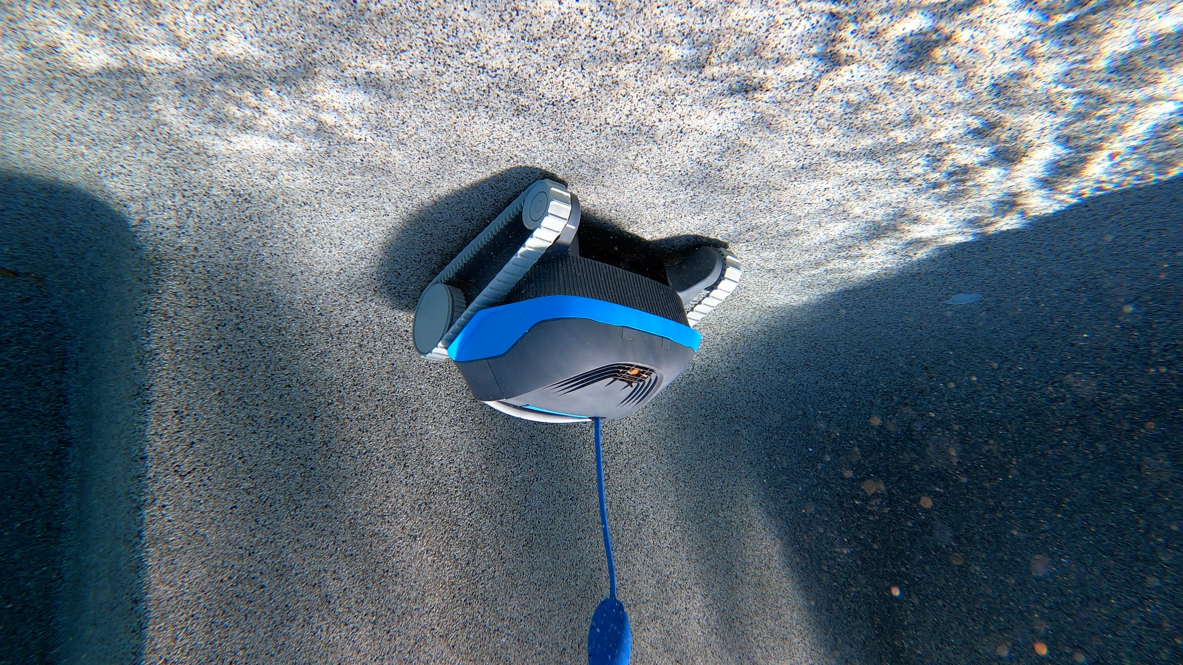 Dolphin Cayman Underwater Robot Ascending Textured Pebble Surface