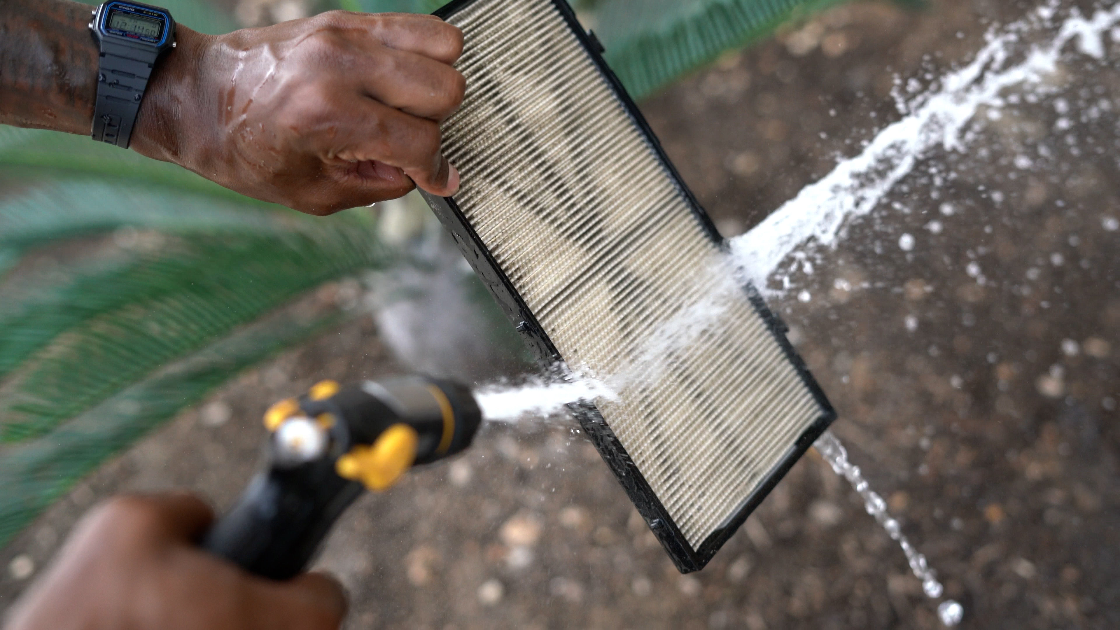 Dolphin Premier Filter Cartridge Sprayed With Water Closeup