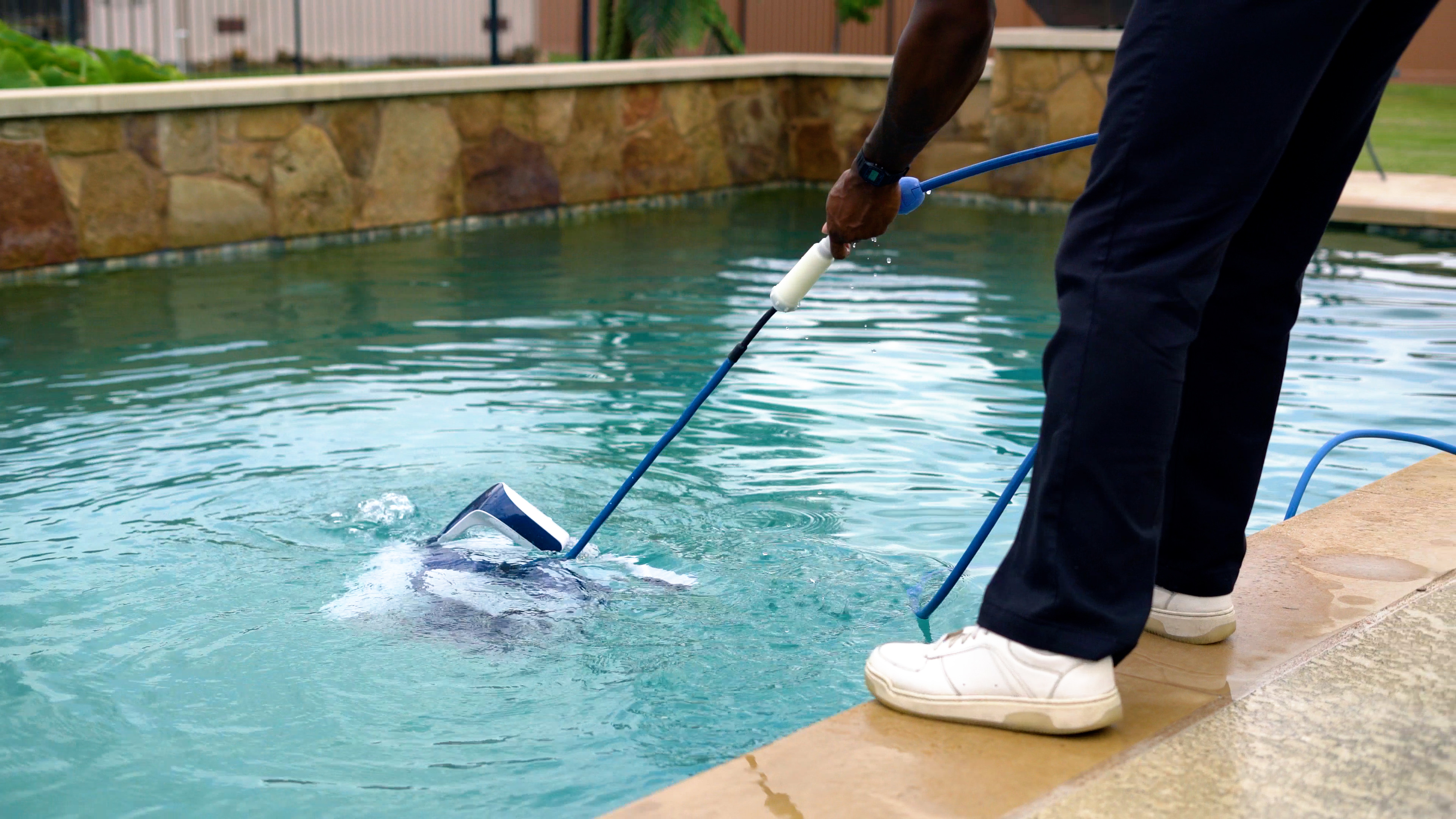 Dolphin Sigma Being Lowered Into Pool With Pole