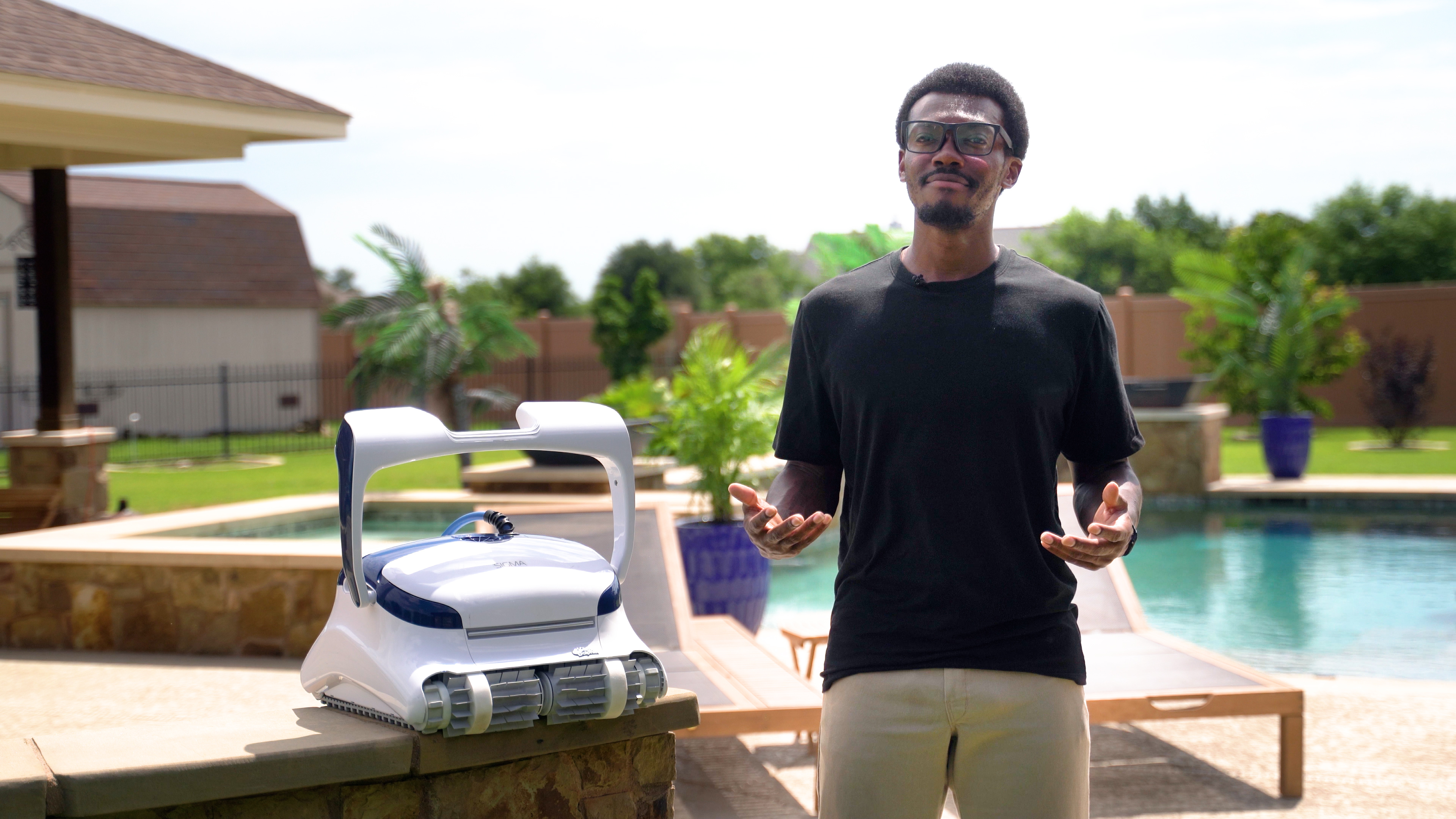 Dolphin Sigma Robot On Ledge With Presenter Poolside
