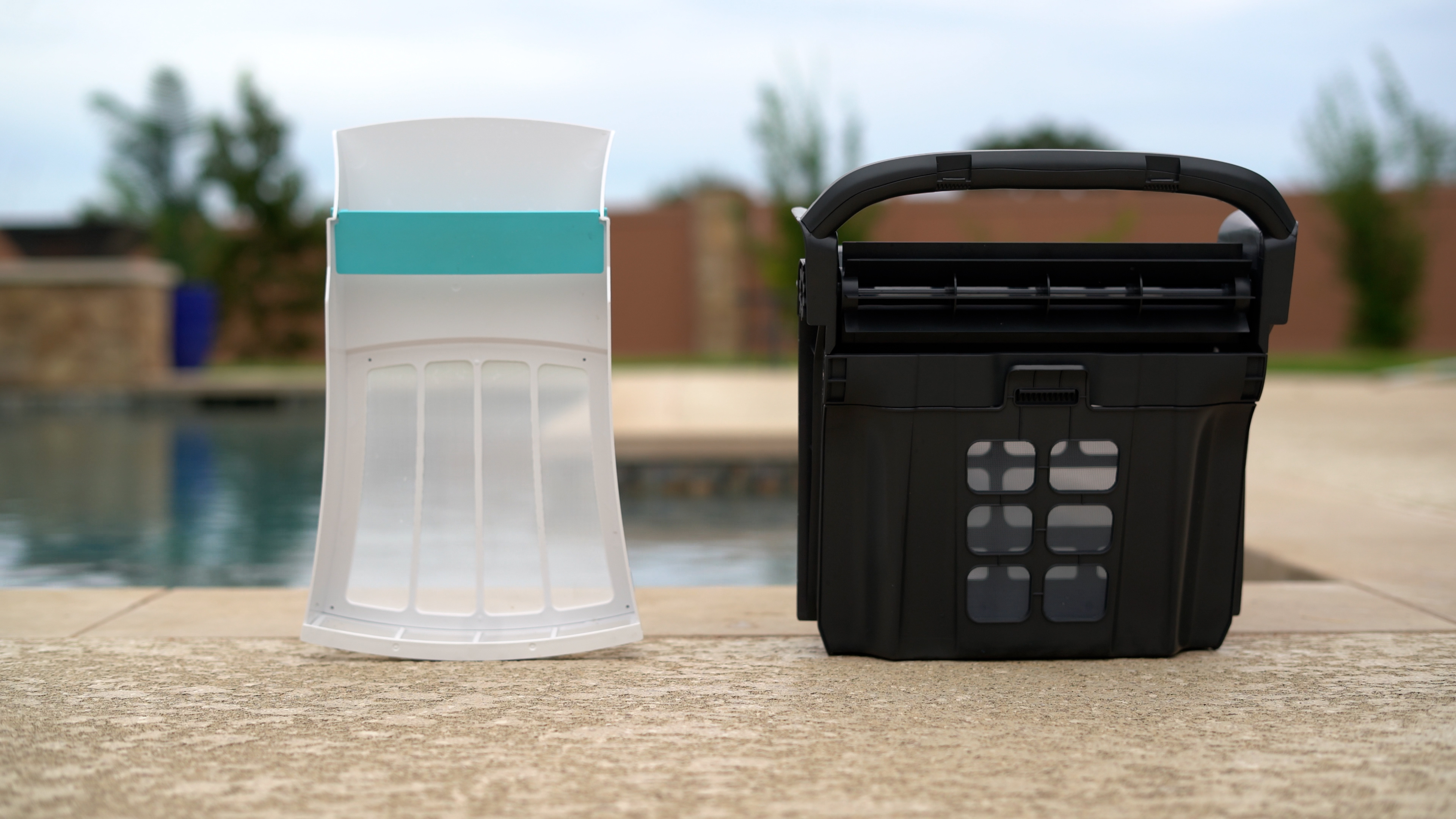 Dolphin Skimmi Filter Basket Assembly Poolside Closeup Blurred Background