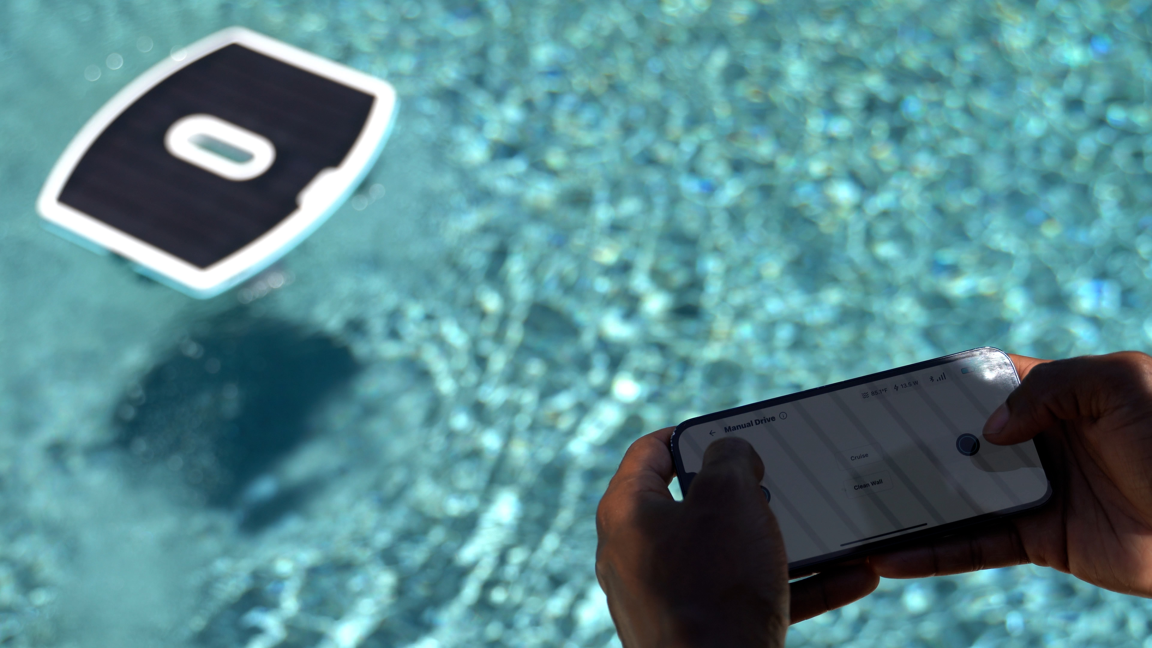 Dolphin Skimmi Person Controls Robot With Phone Poolside