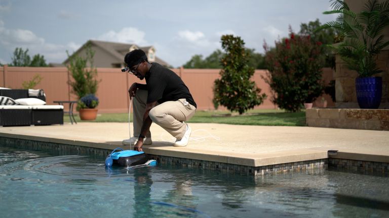 Dolphin Nautilus CC Lowering Into Pool By Reviewer