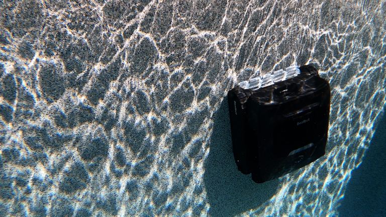 Beatbot Aquasense 2 Pro Scrubbing Sunlit Wall Top Down View