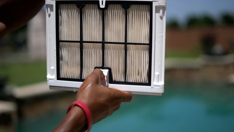 Dolphin Quantum Pro Inspecting Pleated Filter Panel Close Up