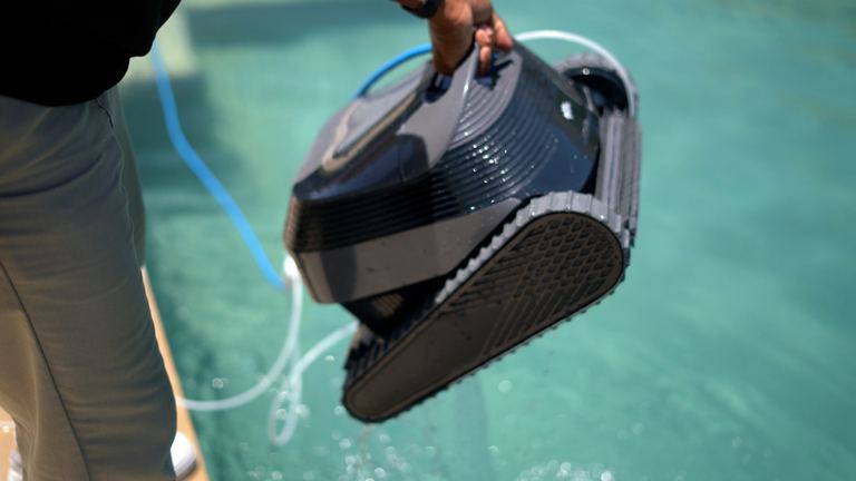 Dolphin Quantum Pro Held Over Water Showing Tracks