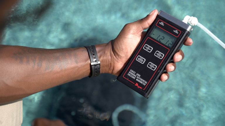 Aiper Scuba X1 Pro Max Suction Power Manometer Reading Close Up