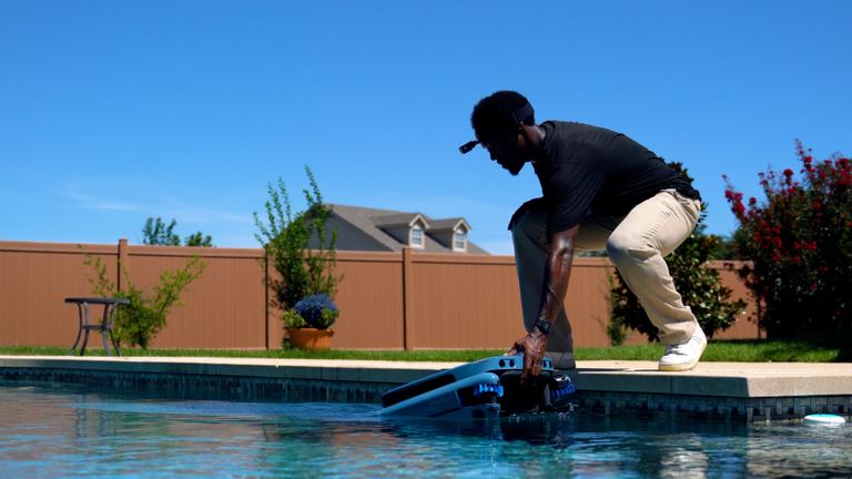 Beatbot Iskim Ultra Placing Robot Into Pool From Edge