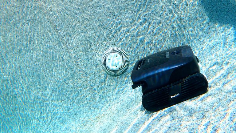 Beatbot AquaSense 2 Ultra Robot Resting Near Pool Drain Underwater