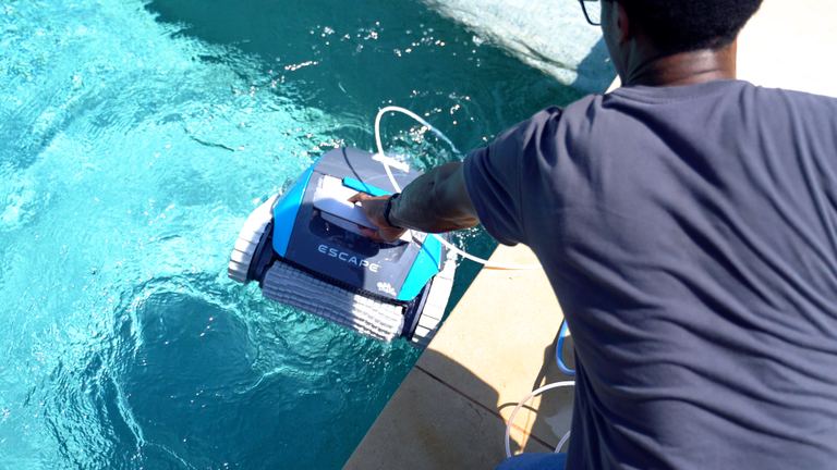 Dolphin Escape Placing Robot Into Bright Blue Pool