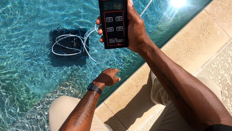 Aiper Scuba X1 Pro Max Pointing At Submerged Unit Manometer POV