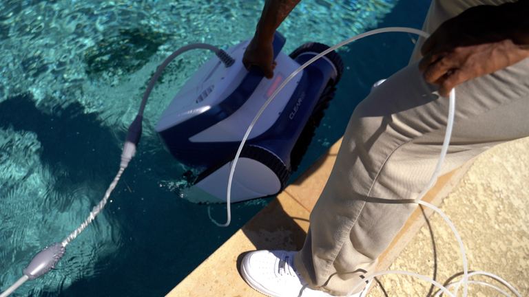 Clear UV Lowering Into Pool By Handle Top View