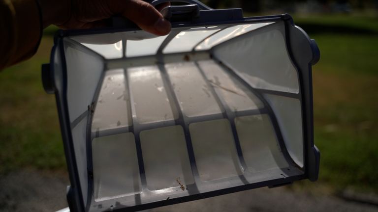 Polaris VRX iQ Holding Filter Basket Debris Inspection